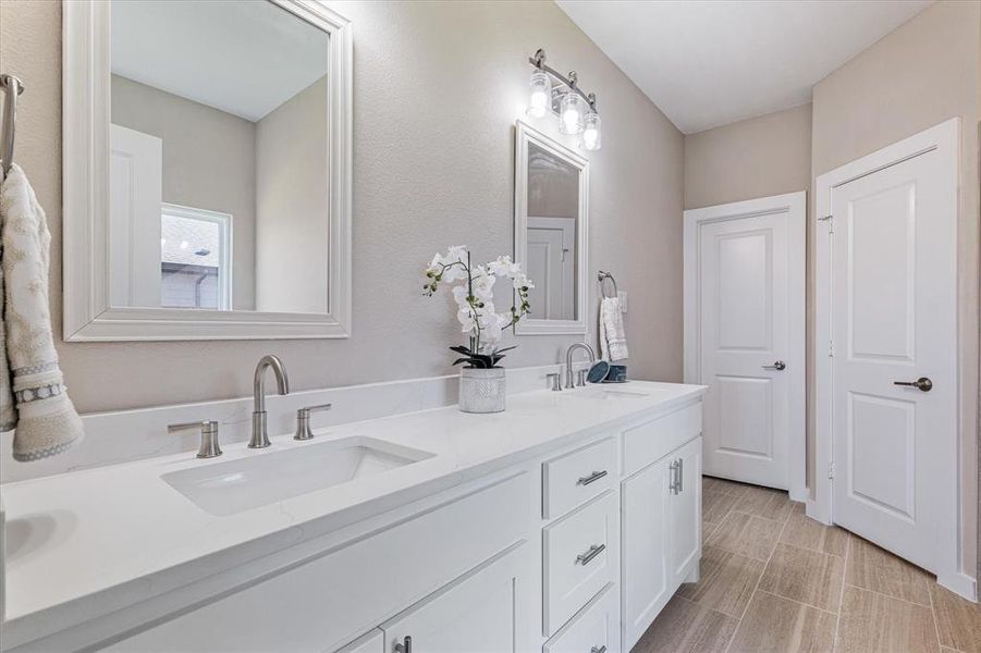 Bathroom featuring vanity Bathroom featuring vanity