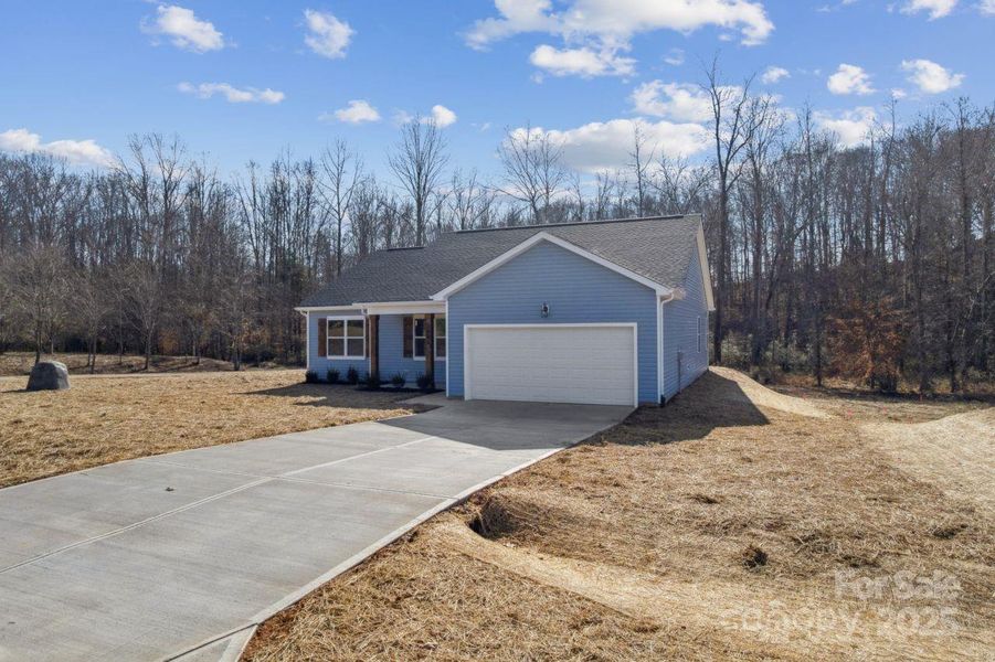 Front exterior of a new home in , Maiden, NC, highlighting curb appeal (Image 18). Front exterior of a new home in , Maiden, NC, highlighting curb appeal (Image 18).
