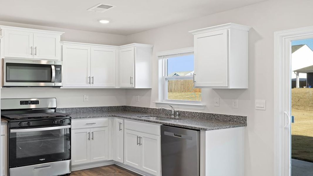 Furnished interior view inside a new home in Lightwood Cottages, Moore (Image 9).