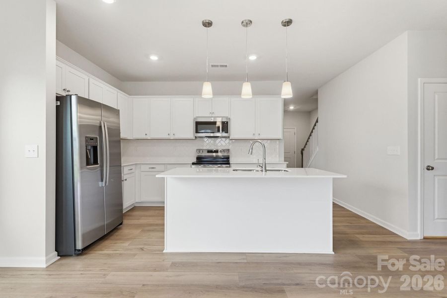 Furnished interior view inside a new home in Piper Creek, Newton (Image 7).