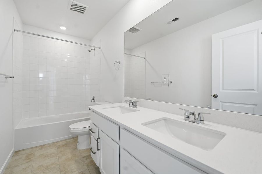Furnished interior view inside a new home in Trailstone, Arvada (Image 15).