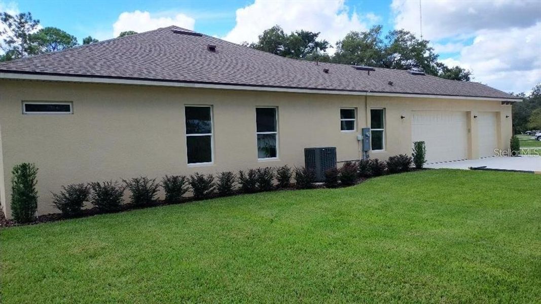 Exterior details and patio area of a home in , Orange City (Image 21).