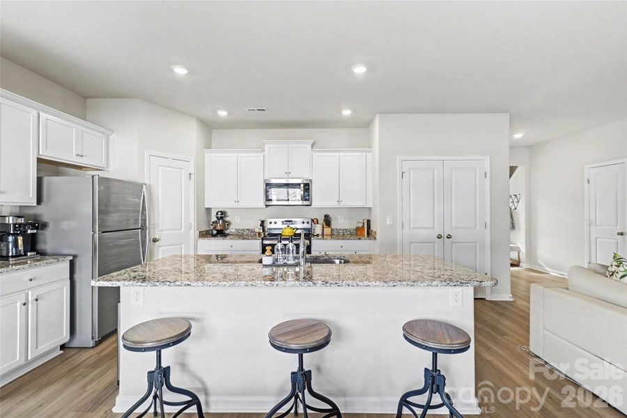 Furnished interior view inside a new home in McKee Creek Village, Charlotte (Image 7).