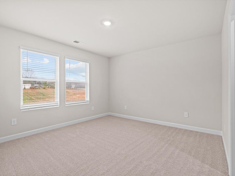 Spacious, unfurnished interior of a new home in Crossing at Abner Creek Townes, Greer (Image 14).