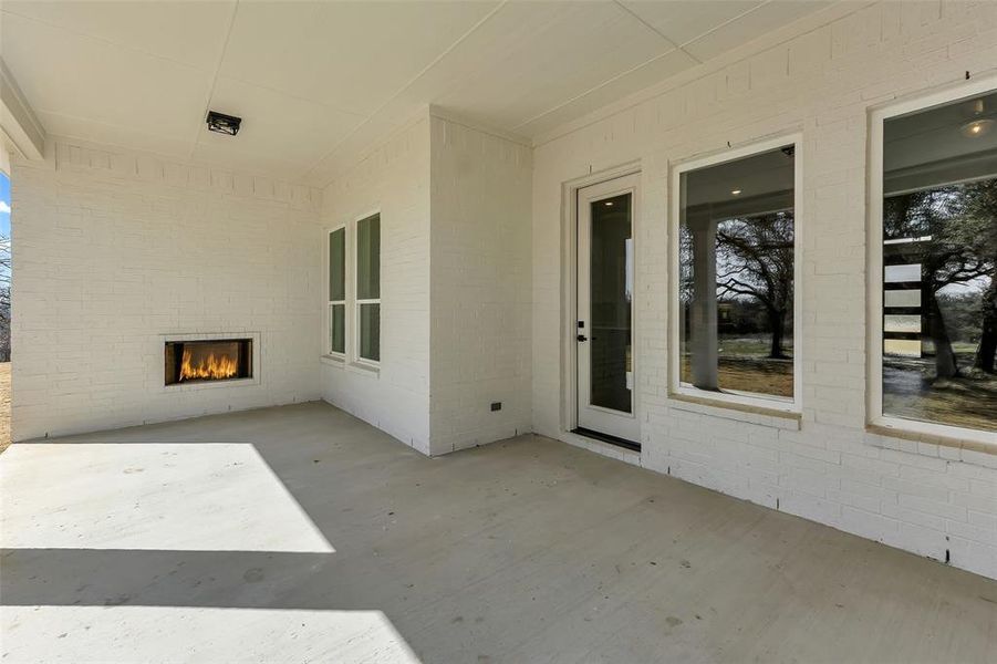 Exterior details and patio area of a home in , Poolville (Image 18).