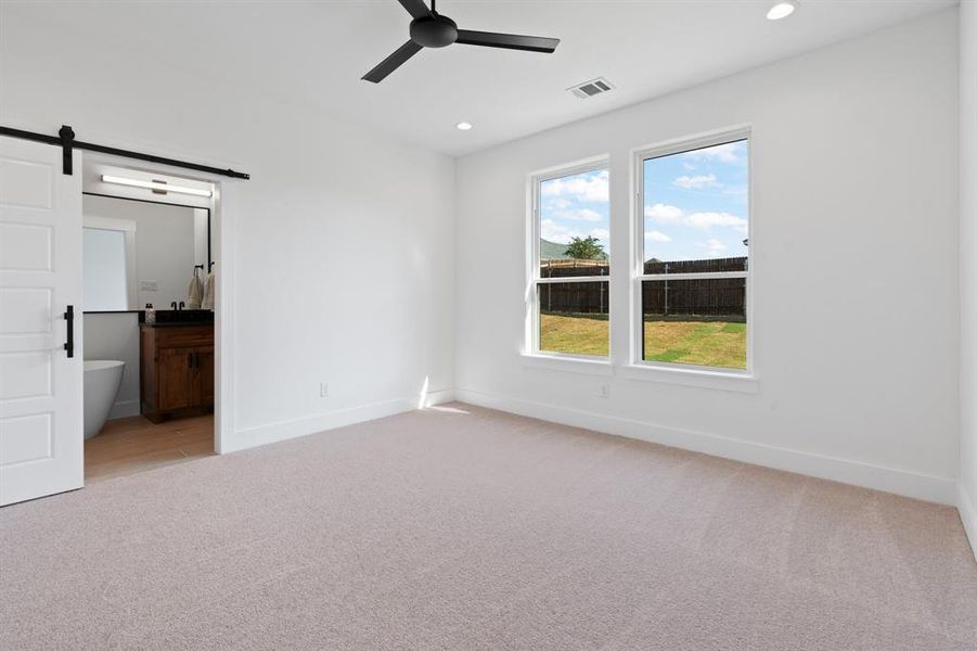 Primary Bedroom tucked away for privacy