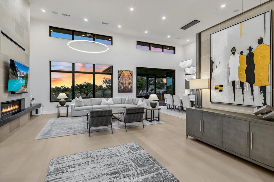 Common area featuring a high ceiling and recessed lighting Common area featuring a high ceiling and recessed lighting