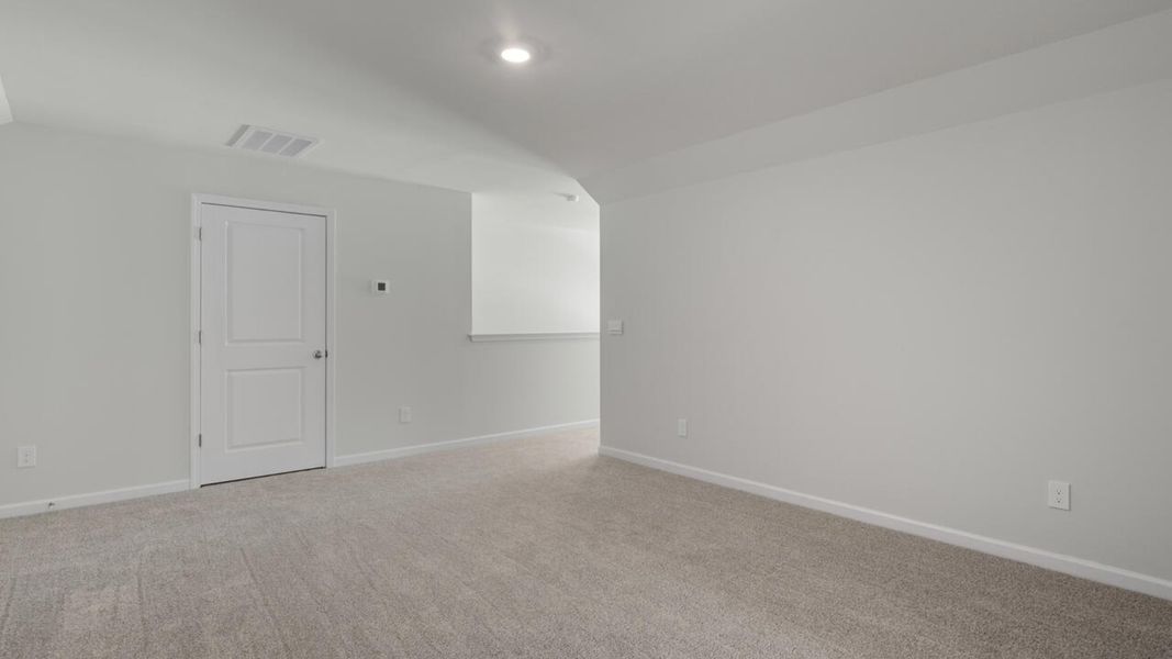 Spacious, unfurnished interior of a new home in Indigo Preserve, Leland (Image 29).