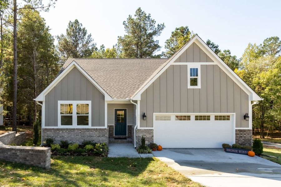 Representative exterior photo of a completed home built from the Linville by Cimarron Homes in Fieldcrest, Mebane, NC (Image 4). Representative exterior photo of a completed home built from the Linville by Cimarron Homes in Fieldcrest, Mebane, NC (Image 4).