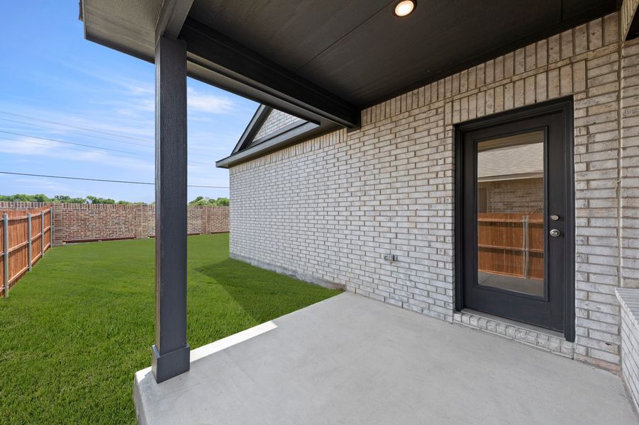 Front exterior of a new home in Churchill, Anna, TX, highlighting curb appeal (Image 25). Front exterior of a new home in Churchill, Anna, TX, highlighting curb appeal (Image 25).