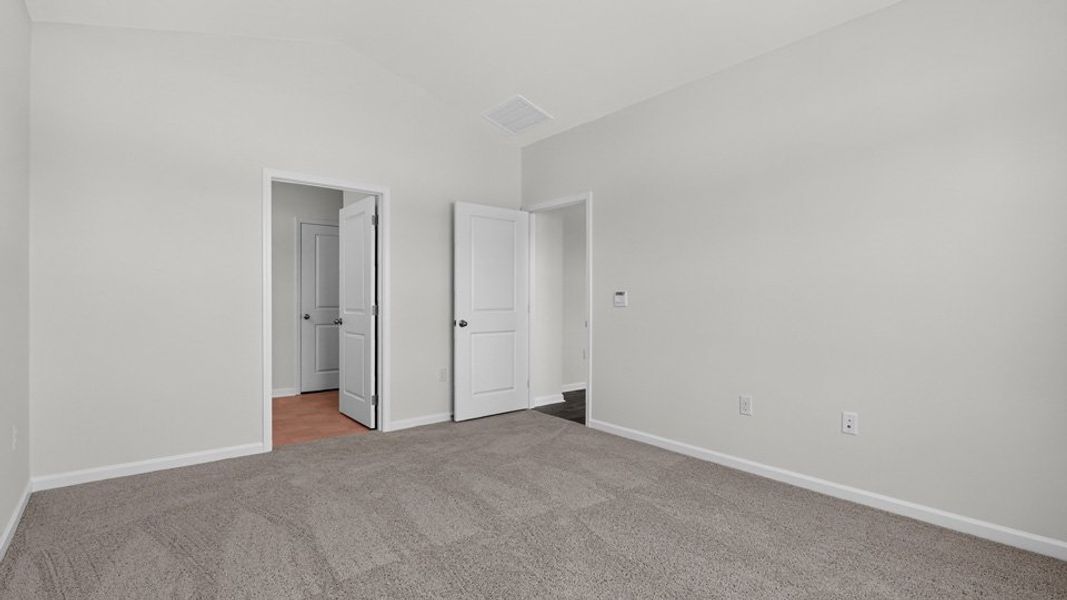 Spacious, unfurnished interior of a new home in The Grove at Matthews Landing, Fuquay Varina (Image 29).
