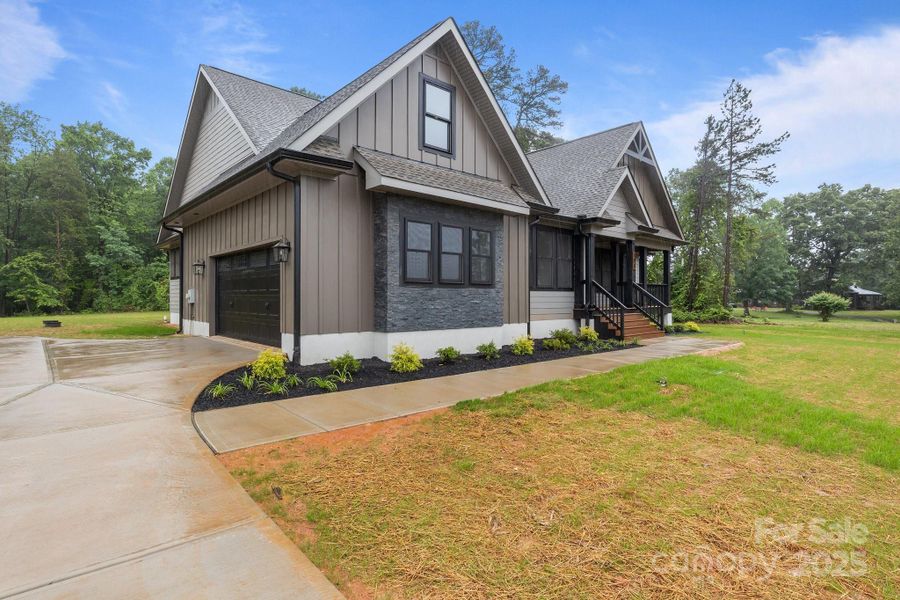 Front exterior of a new home in , Statesville, NC, highlighting curb appeal (Image 19).