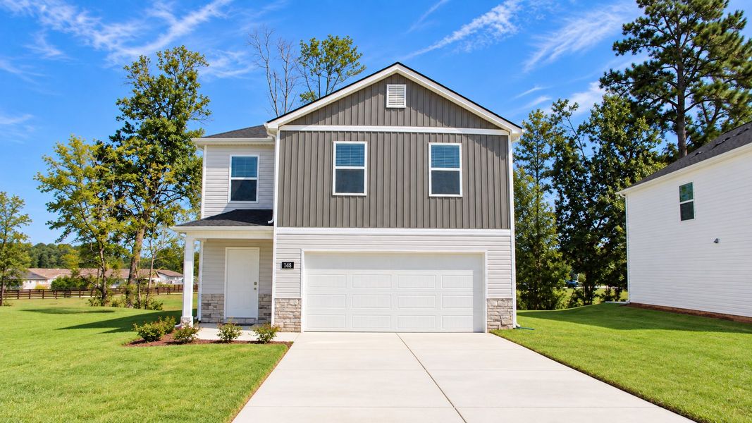 Front exterior of a new home in Evergreen Landing, Rossville, GA, highlighting curb appeal (Image 23).