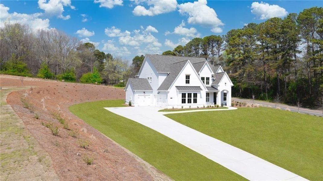 Front exterior of a new home in , Gainesville, GA, highlighting curb appeal (Image 32).
