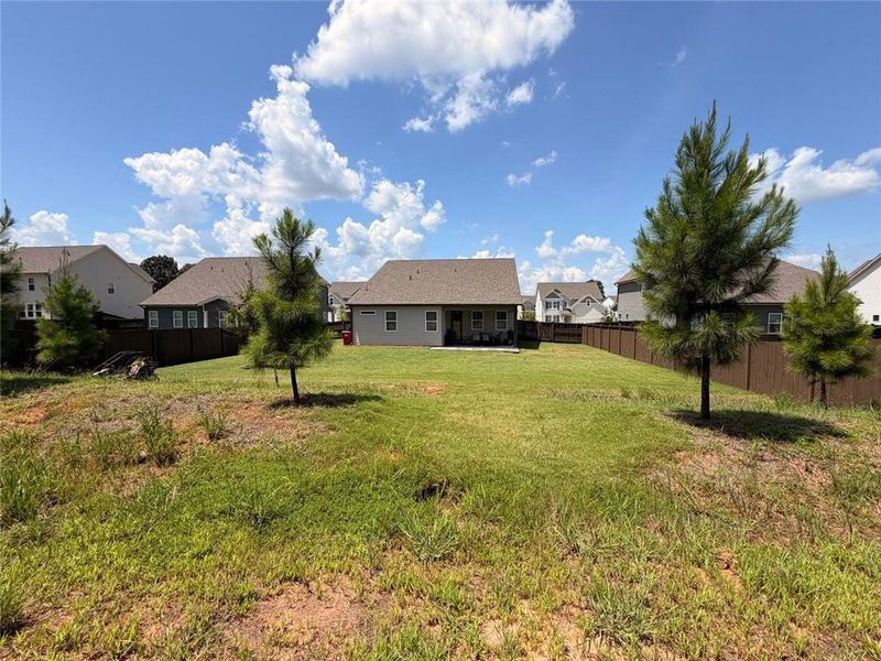 Exterior details and patio area of a home in Wehunt Meadows, Hoschton (Image 24).