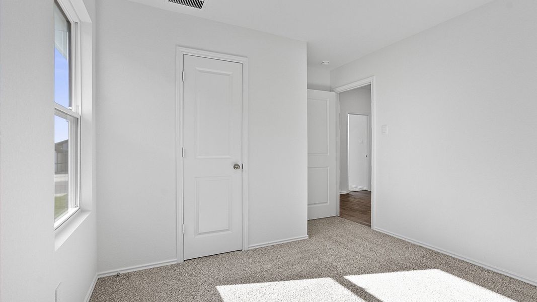 Spacious, unfurnished interior of a new home in Marigold, Kyle (Image 17).