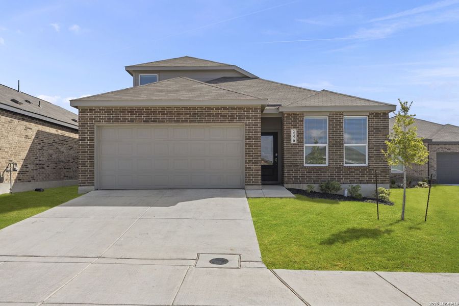 Front exterior of a new home in Grace Valley, Marion, TX, highlighting curb appeal (Image 2).