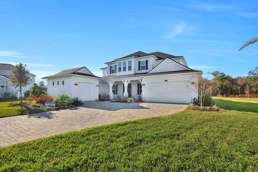 Representative exterior photo of a completed home built from the Seaside by Riverside Homes in Hidden Creek at SilverLeaf, St. Augustine, FL (Image 34). Representative exterior photo of a completed home built from the Seaside by Riverside Homes in Hidden Creek at SilverLeaf, St. Augustine, FL (Image 34).