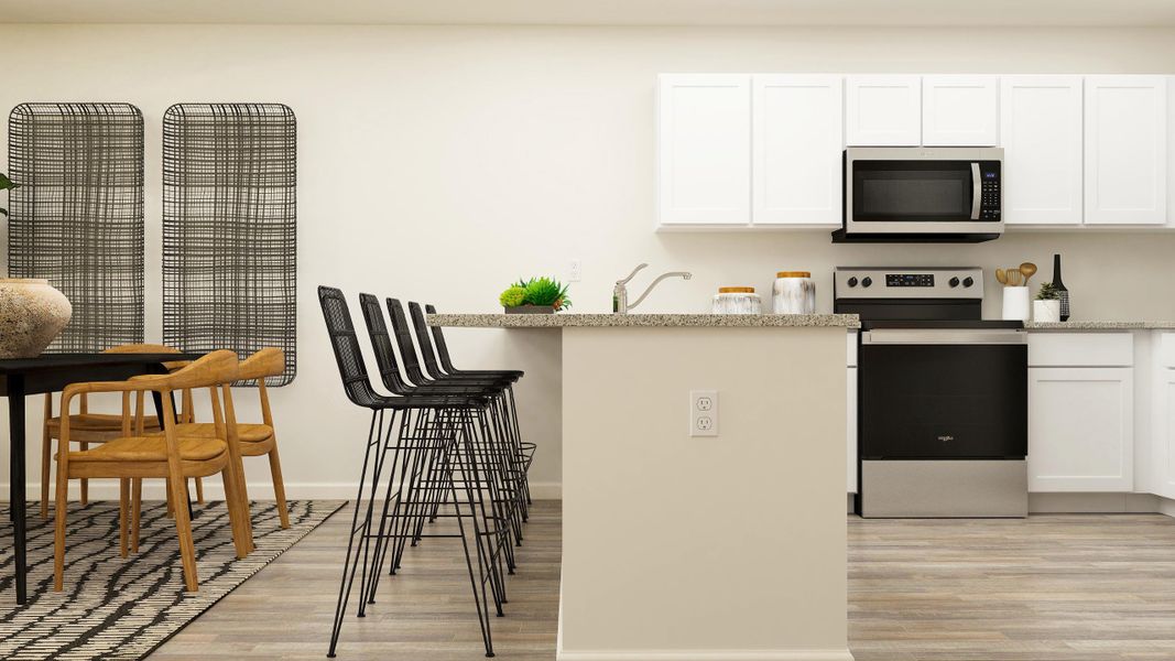 A kitchen with white cabinets. A kitchen with white cabinets.