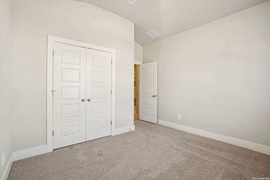 Spacious, unfurnished interior of a new home in Estancia Ranch - Classic Series, San Antonio (Image 18).