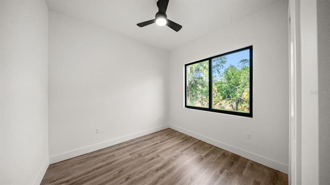 Spacious, unfurnished interior of a new home in , Port Charlotte (Image 30).