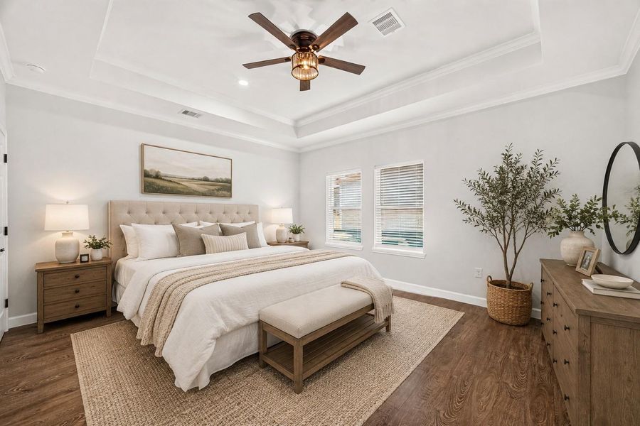 Generously sized primary bedroom with beautiful natural light and warm flooring. Virtually staged.