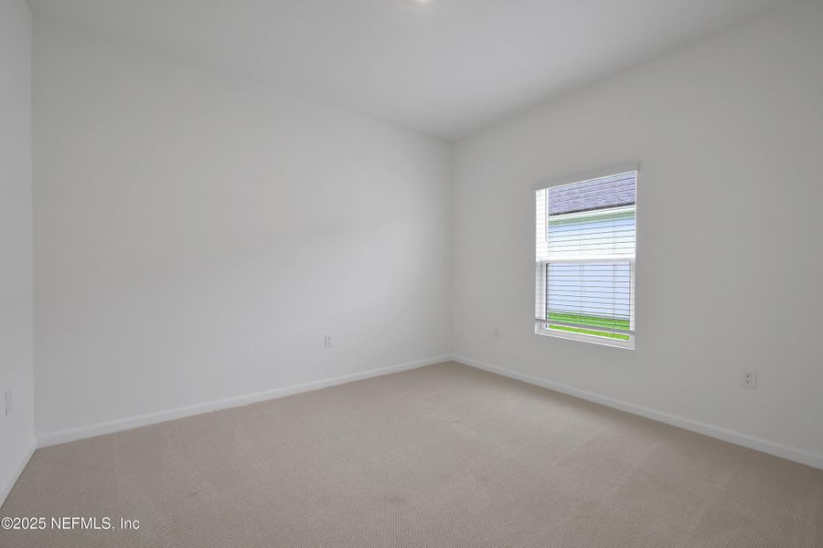 Spacious, unfurnished interior of a new home in Cordova Palms, St. Augustine (Image 32).