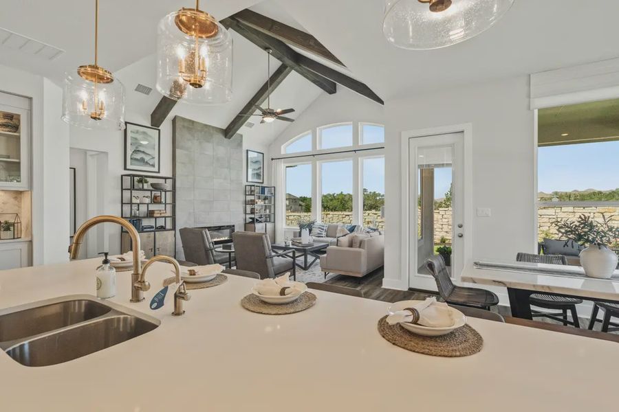Representative furnished interior of a home built from the Mia by Chesmar Homes in Sweetwater, Austin (Image 7).