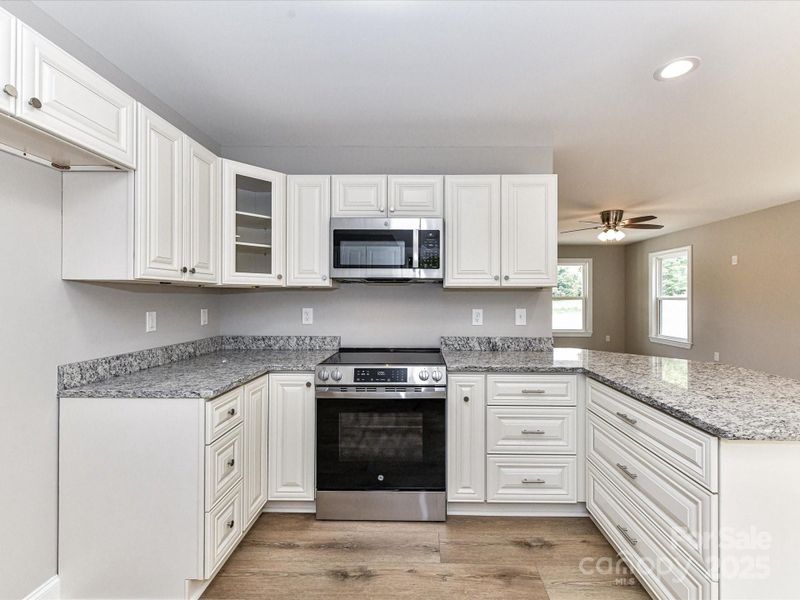Furnished interior view inside a new home in , Oakboro (Image 11).