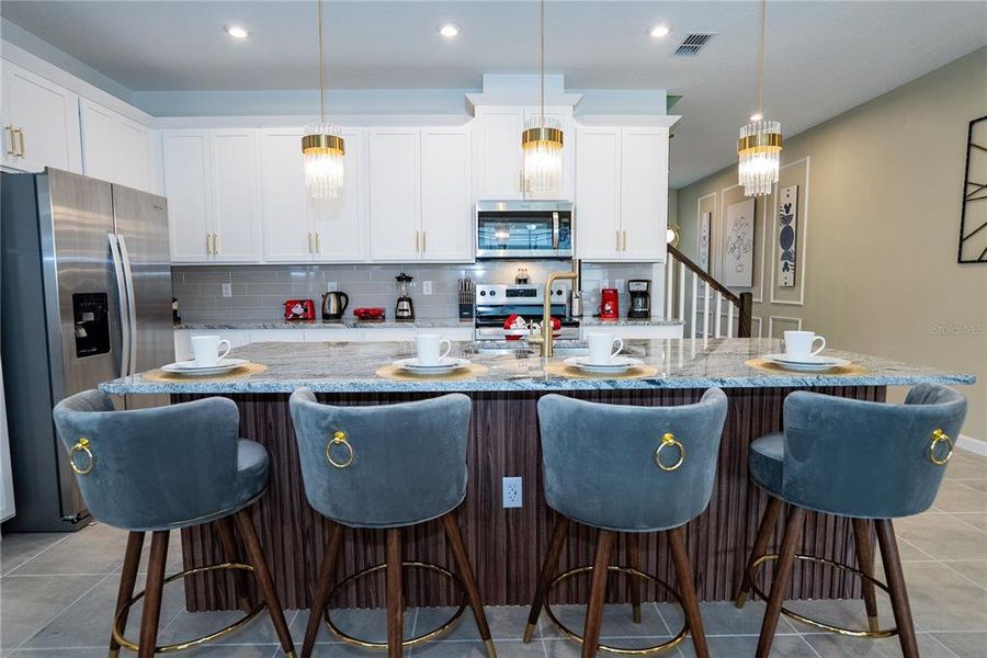 Furnished interior view inside a new home in Solara Resort, Kissimmee (Image 6).