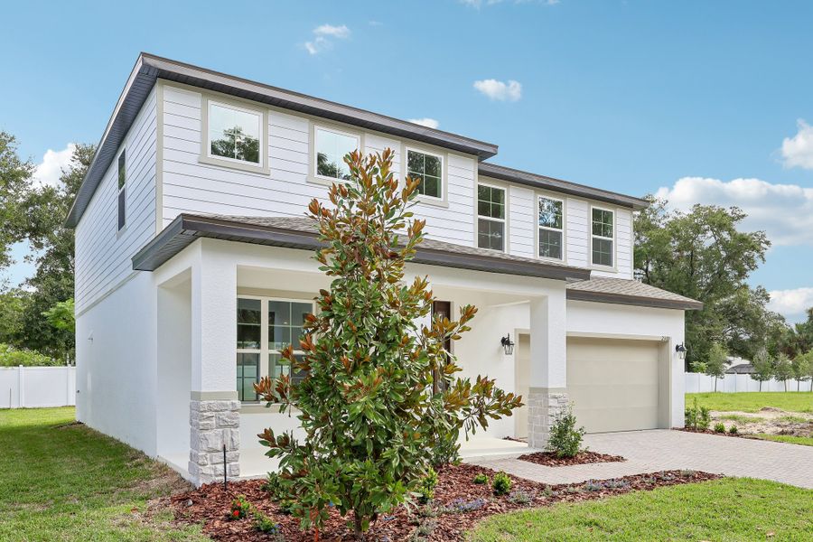 Representative exterior photo of a completed home built from the Florence by Hartizen Homes in Estes Reserve, Eustis, FL (Image 36). Representative exterior photo of a completed home built from the Florence by Hartizen Homes in Estes Reserve, Eustis, FL (Image 36).
