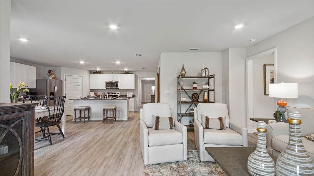 Representative furnished interior of a home built from the Cali by D.R. Horton in Owl's Head East, Freeport (Image 13).