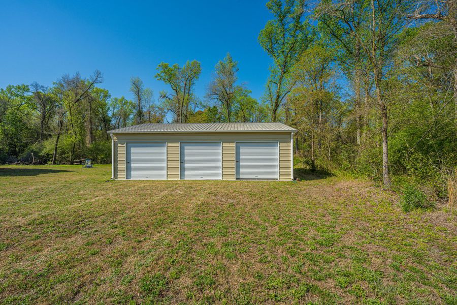 Exterior details and patio area of a home in , Cottageville (Image 23).