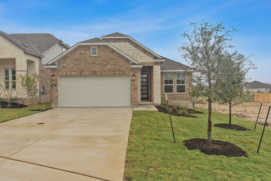 Representative exterior photo of a completed home built from the Avery by Chesmar Homes in Highland Village, Georgetown, TX (Image 1). Representative exterior photo of a completed home built from the Avery by Chesmar Homes in Highland Village, Georgetown, TX (Image 1).