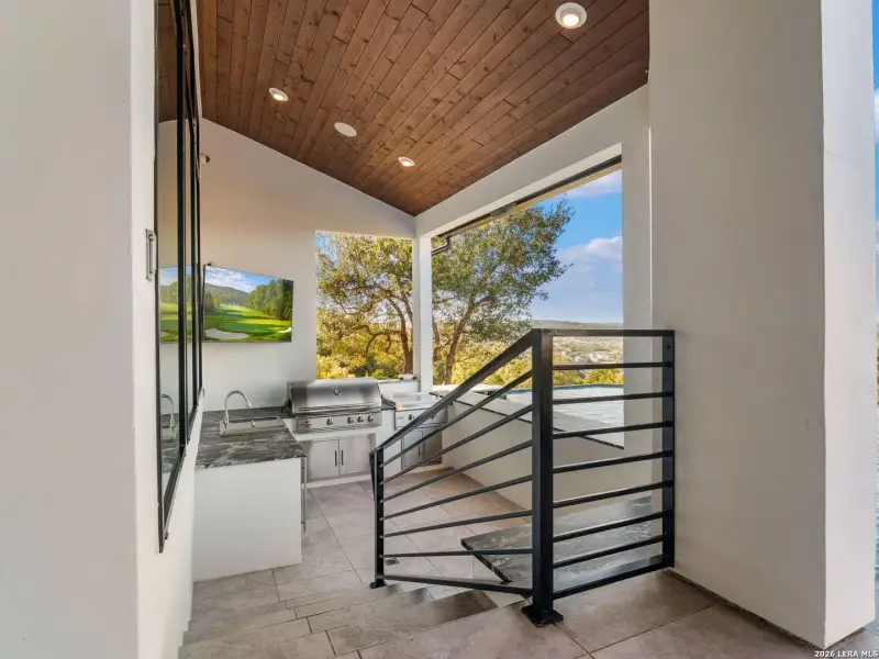 Exterior details and patio area of a home in , San Antonio (Image 29).