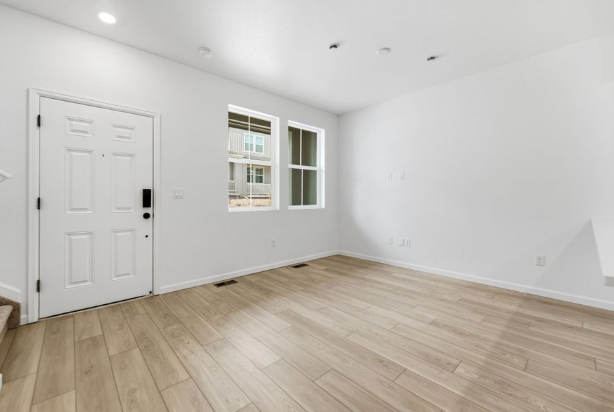 Spacious, unfurnished interior of a new home in Trailstone, Arvada (Image 19).