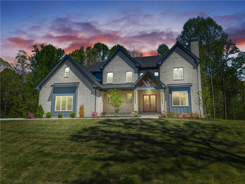 Front exterior of a new home in , Hoschton, GA, highlighting curb appeal (Image 30).