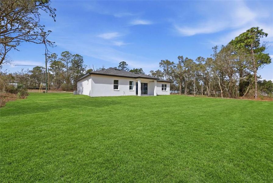 Exterior details and patio area of a home in , Ocala (Image 3).