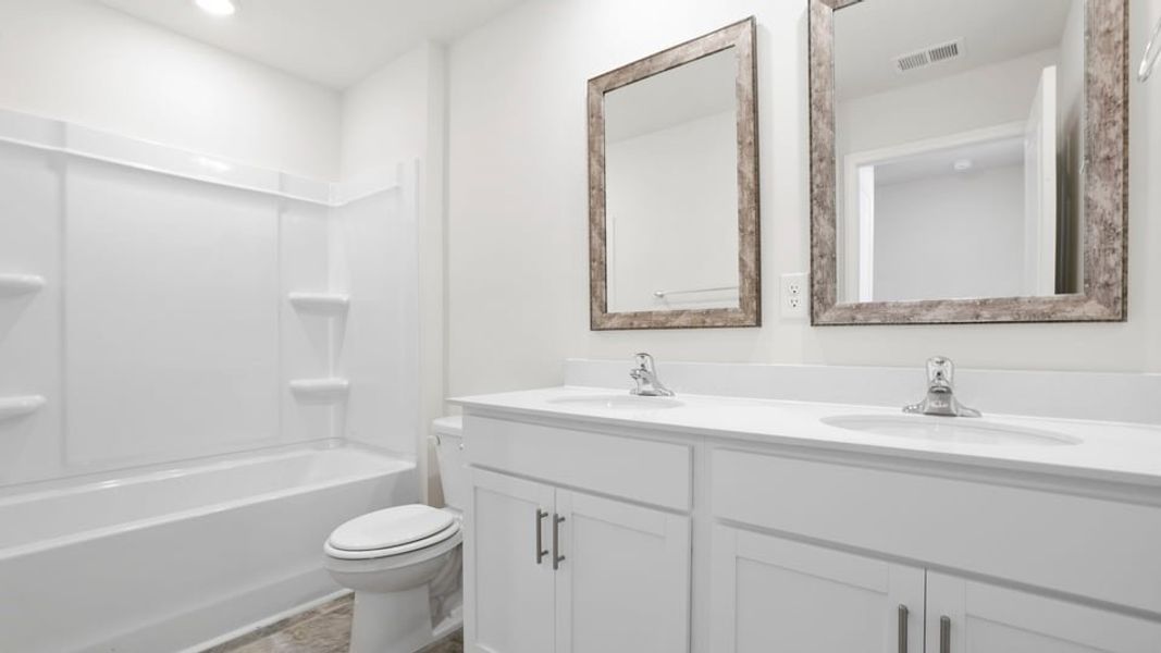 Furnished interior view inside a new home in Durbin Meadows Traditions, Fountain Inn (Image 11).