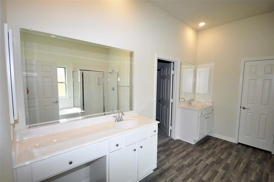 Separate Vanities in the Master Bath.  And yes, Medicine Cabinets are standard at Cervelle Homes.