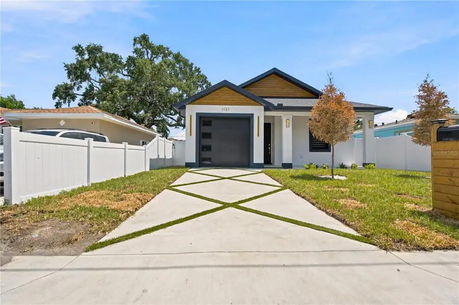 Front exterior of a new home in , Clearwater, FL, highlighting curb appeal (Image 21). Front exterior of a new home in , Clearwater, FL, highlighting curb appeal (Image 21).