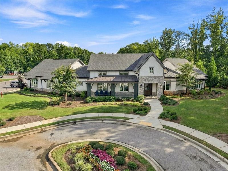 Front exterior of a new home in , Hoschton, GA, highlighting curb appeal (Image 1). Front exterior of a new home in , Hoschton, GA, highlighting curb appeal (Image 1).