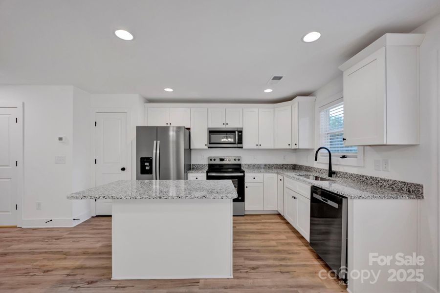 Furnished interior view inside a new home in , Concord (Image 9).