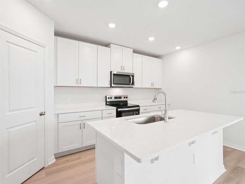 Furnished interior view inside a new home in Magnolia Bay - Classic Series, Nokomis (Image 9). Furnished interior view inside a new home in Magnolia Bay - Classic Series, Nokomis (Image 9).