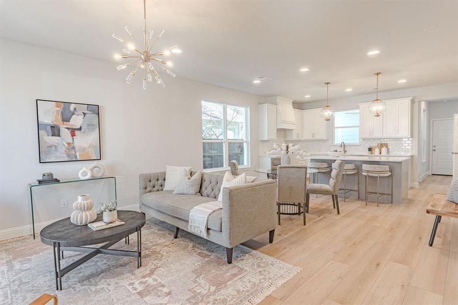 The following photos depict how furniture can fit in the space and are of a similar layout to the one at 407 Athenia. Actual selections may differ slightly.