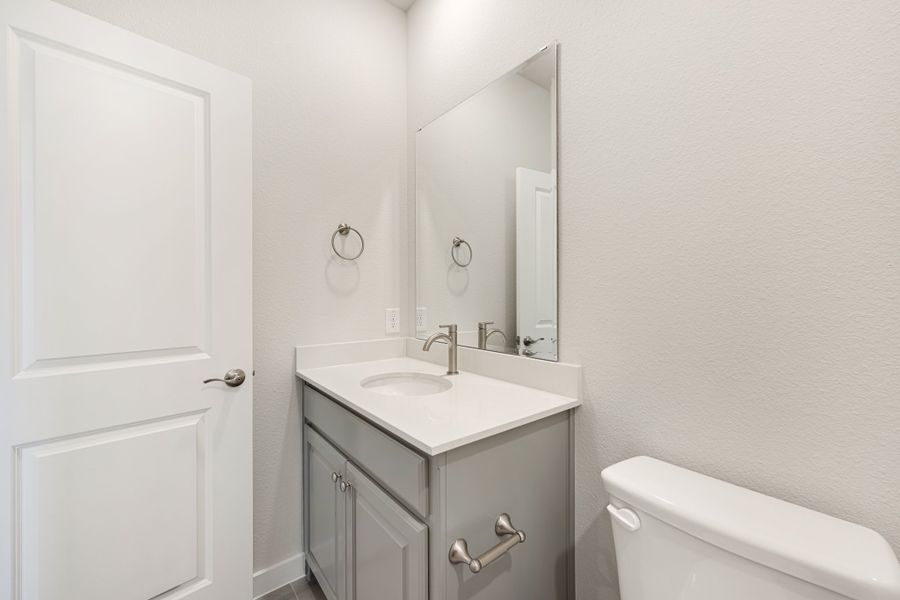 Furnished interior view inside a new home in Cottonwood Creek, Rowlett (Image 14).
