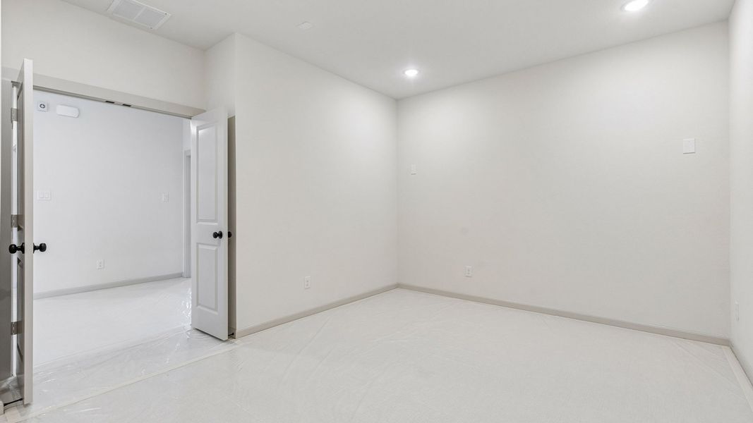 Representative unfurnished interior of a home built from the Toulouse II by Normandy Homes in Rainwater Crossing, Celina (Image 14).