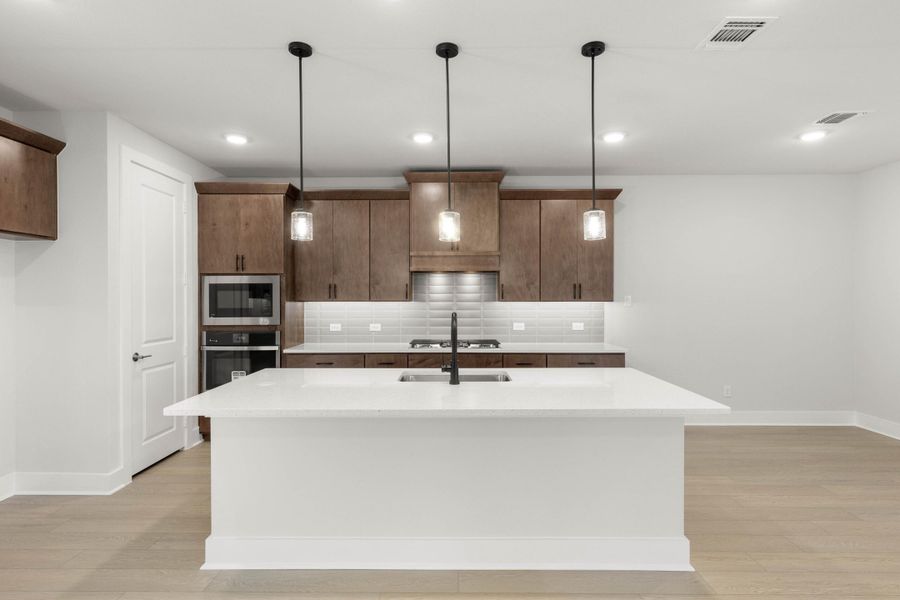 Furnished interior view inside a new home in Terrace Collection at Harvest, Argyle (Image 3).