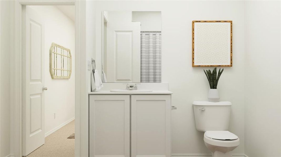 Bathroom with vanity and toilet