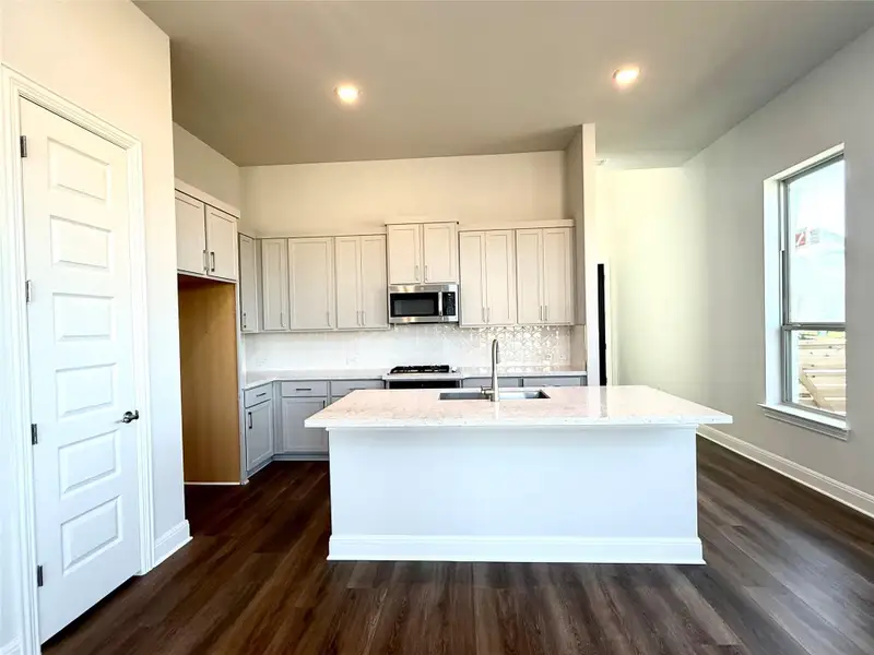 Furnished interior view inside a new home in Flora, Hutto (Image 7).